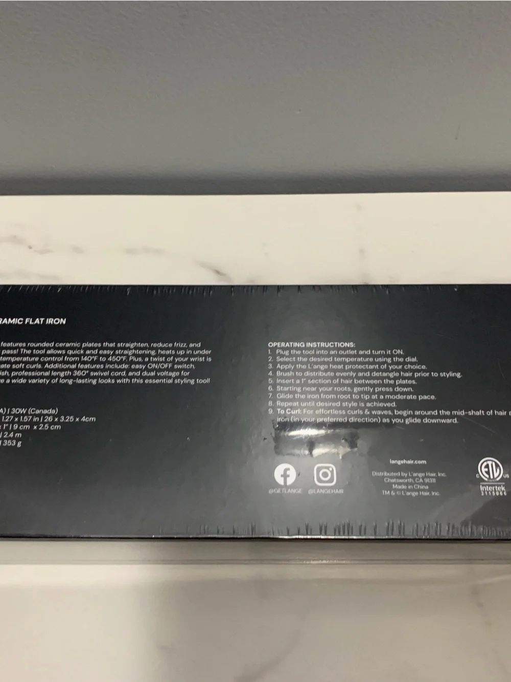 Lange black flat iron (new/sealed)